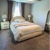 Photo 1: Furnished bedroom 
