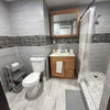Photo 6: Large bathroom. Stone standing shower.