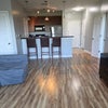 Photo 2: Living Area + Kitchen