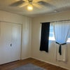 Photo 4: Private 14 x 14 bedroom hardwood floor ceiling fan