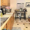 Photo 3: Stocked kitchen 
