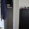 Photo 2: Closet and very tall vertical dresse makes clothing storage easy