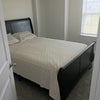 Photo 2: Small bedroom upstairs with bed and TV