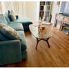 Photo 7: bright greatroom, warm french blue sectional, no rug currently