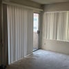Photo 2:  "Shared bright living room leading out to a spacious private balcony."