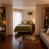 Photo 2: AI Rendering of Furnished Rented Room Curtain Open