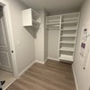 Photo 3: Large walk-in closet with shelving