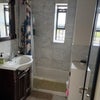 Photo 3: Bathroom with tub