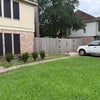 Photo 2: June 2026, Driveway and vehicle gate.