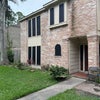 Photo 4: June 2026, Left side of house, solar screen all around.