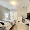 Photo 7: Bedroom with Shared Jack-and-Jill Bathroom