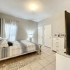 Photo 8: Bedroom with Shared Jack-and-Jill Bathroom