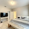 Photo 5: Primary Suite #1 – Private Bath & Garage Parking