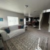 Photo 6: Living room, dining area, kitchen (and Buddy's tail LOL)