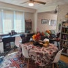 Photo 2: Dining room now doing double duty (roommate storage, craft projects)