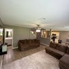 Photo 9: Shared Living Room / Kitchen / Guest Bathroom