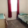 Photo 3: front room with window