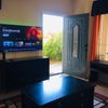 Photo 7: Tv in lounge with fan