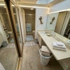 Photo 2: Master bath/her vanity closet