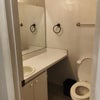 Photo 5: Medicine cabinet and storage area
