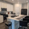 Photo 3: Large, modern kitchen, Everyone gets a shelf in the pantry 