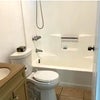 Photo 6: Full Bathroom Storage and Tub.
