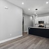 Photo 1: Living Room / Kitchen