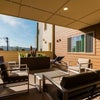 Photo 7: Open air common areas on each floor with outdoor furniture