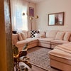 Photo 4: shared living room, very comfy couch with blankets that actually get washed frequently!