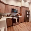 Photo 5: kitchen with gas stove