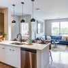 Photo 9: The Rive Kitchen and Living Room Area