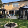 Photo 5: Backyard is 1/2 acres furnished with covered patio, 2 gazebos, jacuzzi + patio lighting + fan 