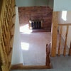 Photo 7: downstairs and fireplace