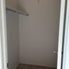 Photo 9: Walk-in bedroom 1 closet