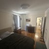 Photo 2: Spacious bedroom.