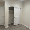 Photo 4: Downstairs bedroom closet