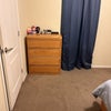 Photo 5: Dresser and navy blue curtains 