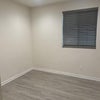 Photo 3: Downstairs Bedroom