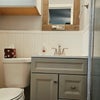Photo 3: Small bright private bathroom