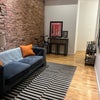 Photo 5: Shared living room with high ceilings