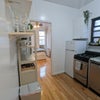 Photo 4: Kitchen with dishwasher and in unit washer / dryer