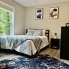 Photo 1: Large Bedroom with Large Windows