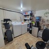 Photo 9: Washer, Dryer and Exercise Equipment