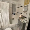 Photo 7: USE OF SHOWER AND SHOWER