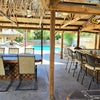 Photo 4: Tiki bar with TV