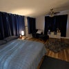 Photo 4: Solid blackout curtains on all windows, helpful for daytime sleep or night-shift schedules.