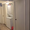 Photo 3: Laundry machine, dryer, supply closet