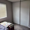 Photo 2: first bedroom, closet and window