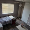 Photo 4: first bedroom, open closet and clearer view of the window and ceiling fan