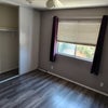 Photo 7: second bedroom closet and window